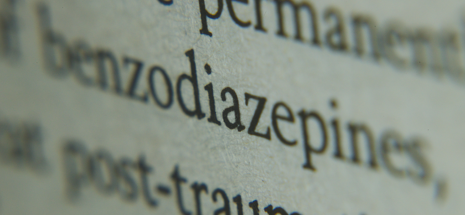 A close up of the typed words benzodiazepines and post-traumatic.