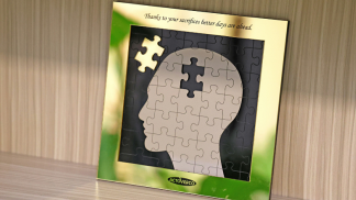 Image of a puzzle of a head with the quote "Thanks to your sacrifices better days are ahead."